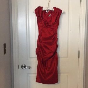 Cache size 0 red ruffled dress.